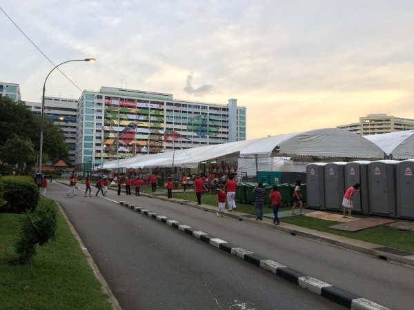LHS Event Tents Roadside Setup at Dusk